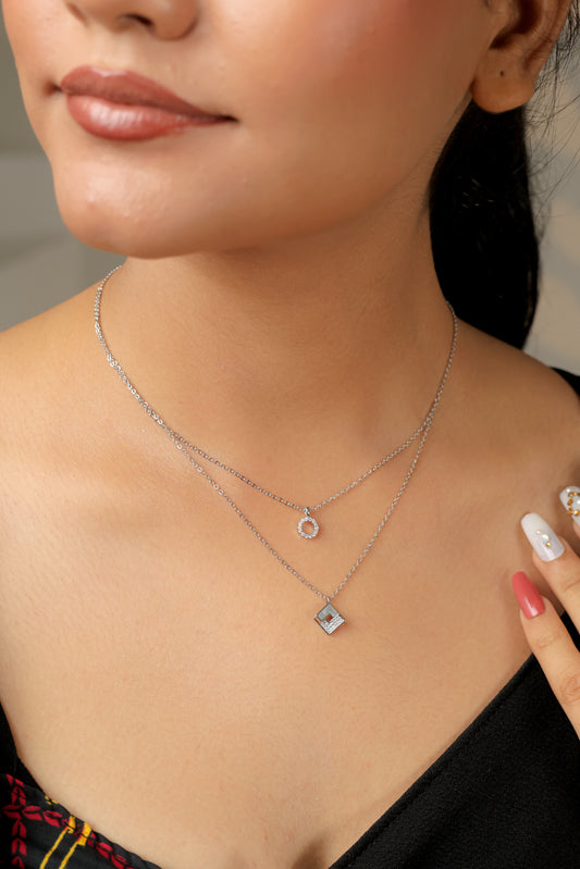 Silver Layered Necklace with Geometric & Circle Zircon Pendants – Elegant Dual Chain Design